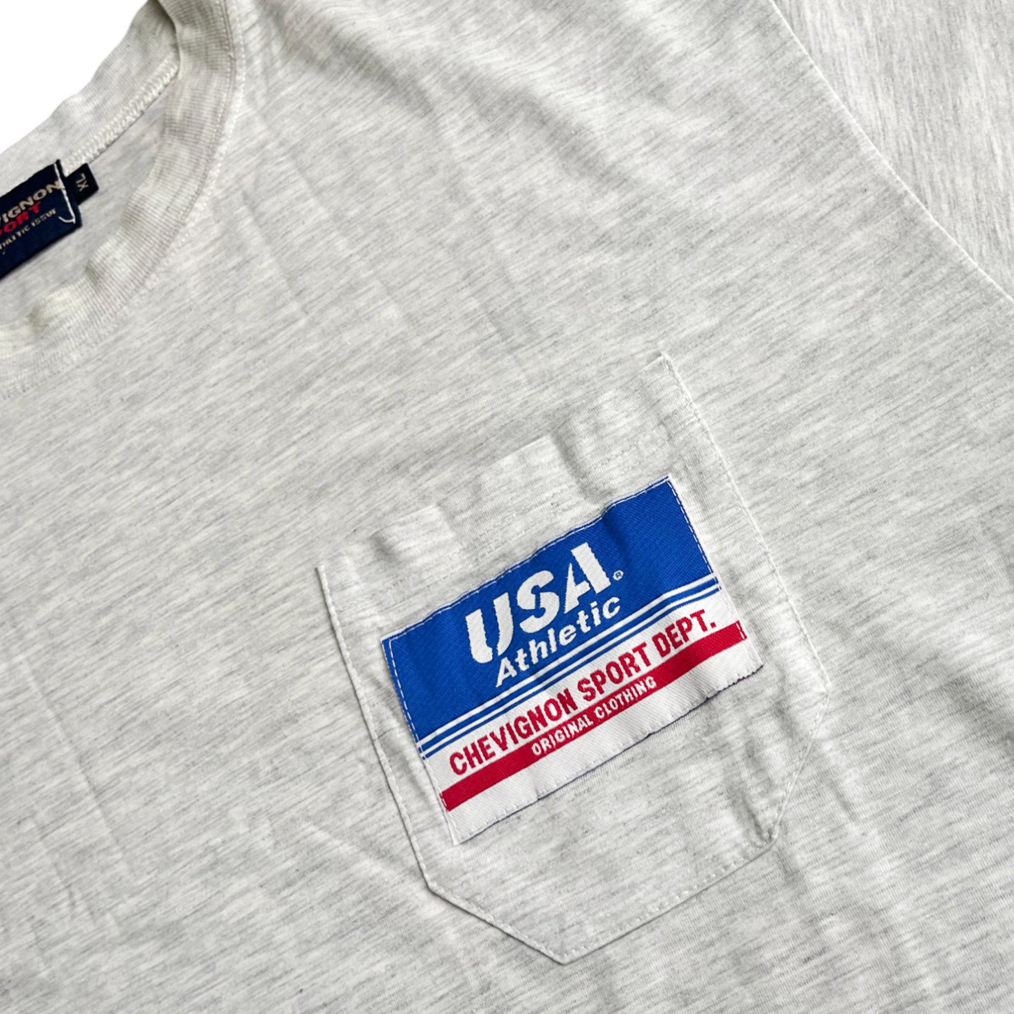 Vintage 90's Chevignon Sport Pocket USA T-shirt (XL)
